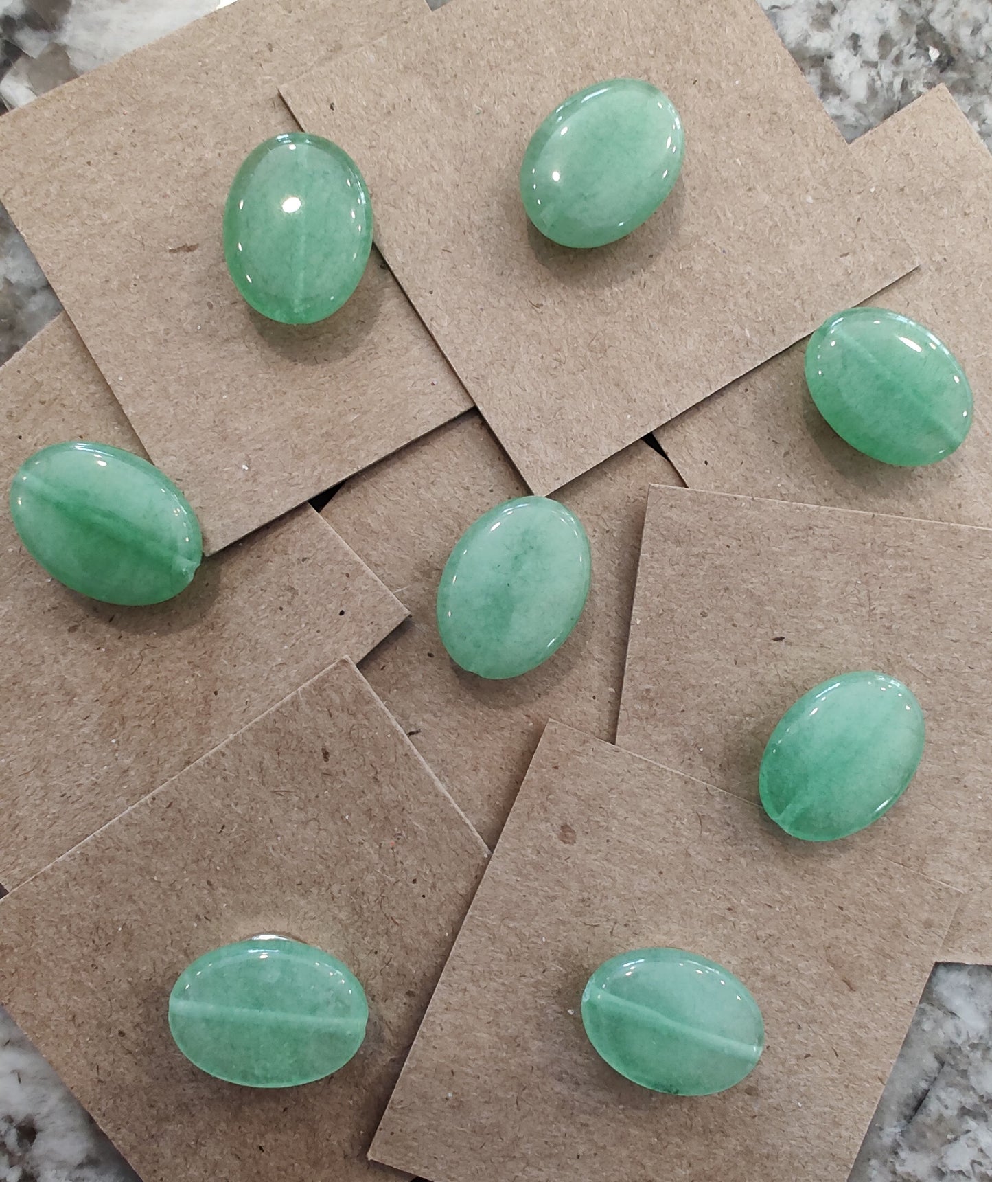 NeedleMinder - Lt. Green Oval w/needle hole