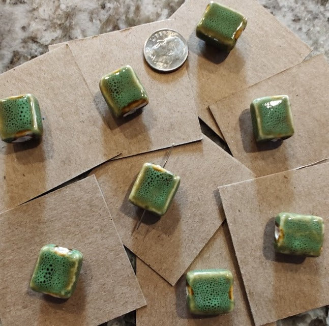 Needleminder- Green Clay with Black Specks w/needle hole