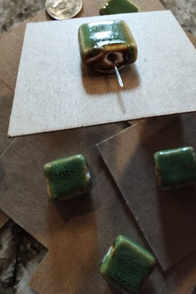 Needleminder- Green Clay with Black Specks w/needle hole