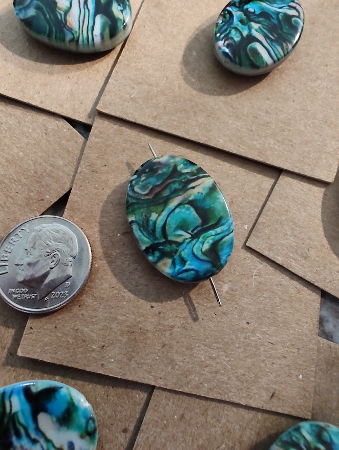 Needleminder- Blue-Green-Black Swirl w/needle hole