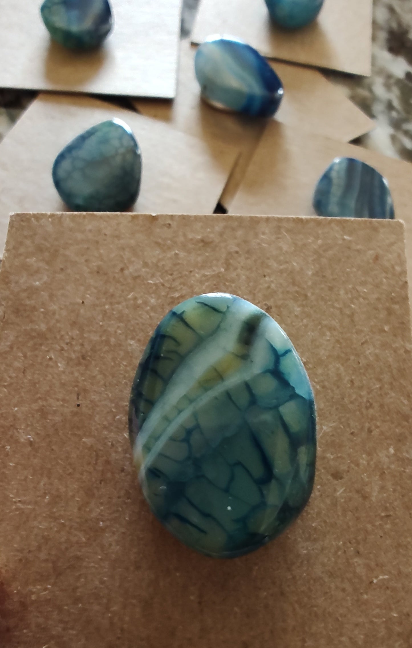 Needleminder- Blue Marbled Glass w/needle hole